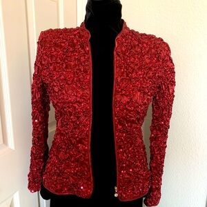 Burgundy evening jacket with sequins.